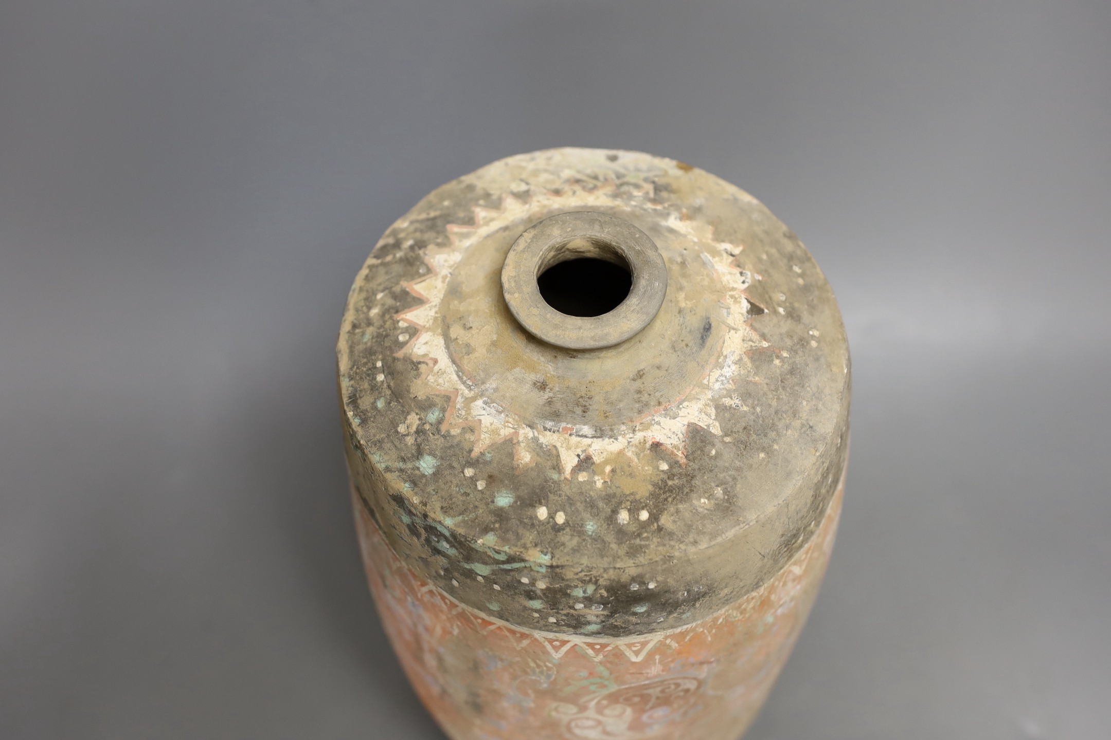 A Chinese pigment painted grey pottery jar, Han dynasty (200BCE - 220CE), 29cm high